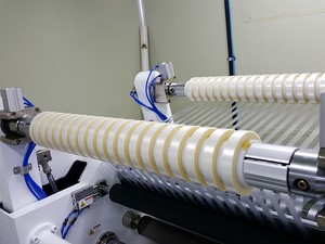 Dos ejes de rebobinado con gran control de tensión