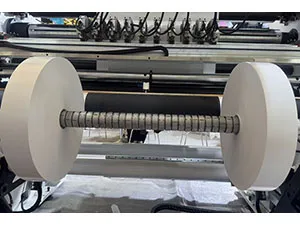 Eje diferencial de rebobinado (eje expansible neumático disponible para el corte longitudinal de papel)